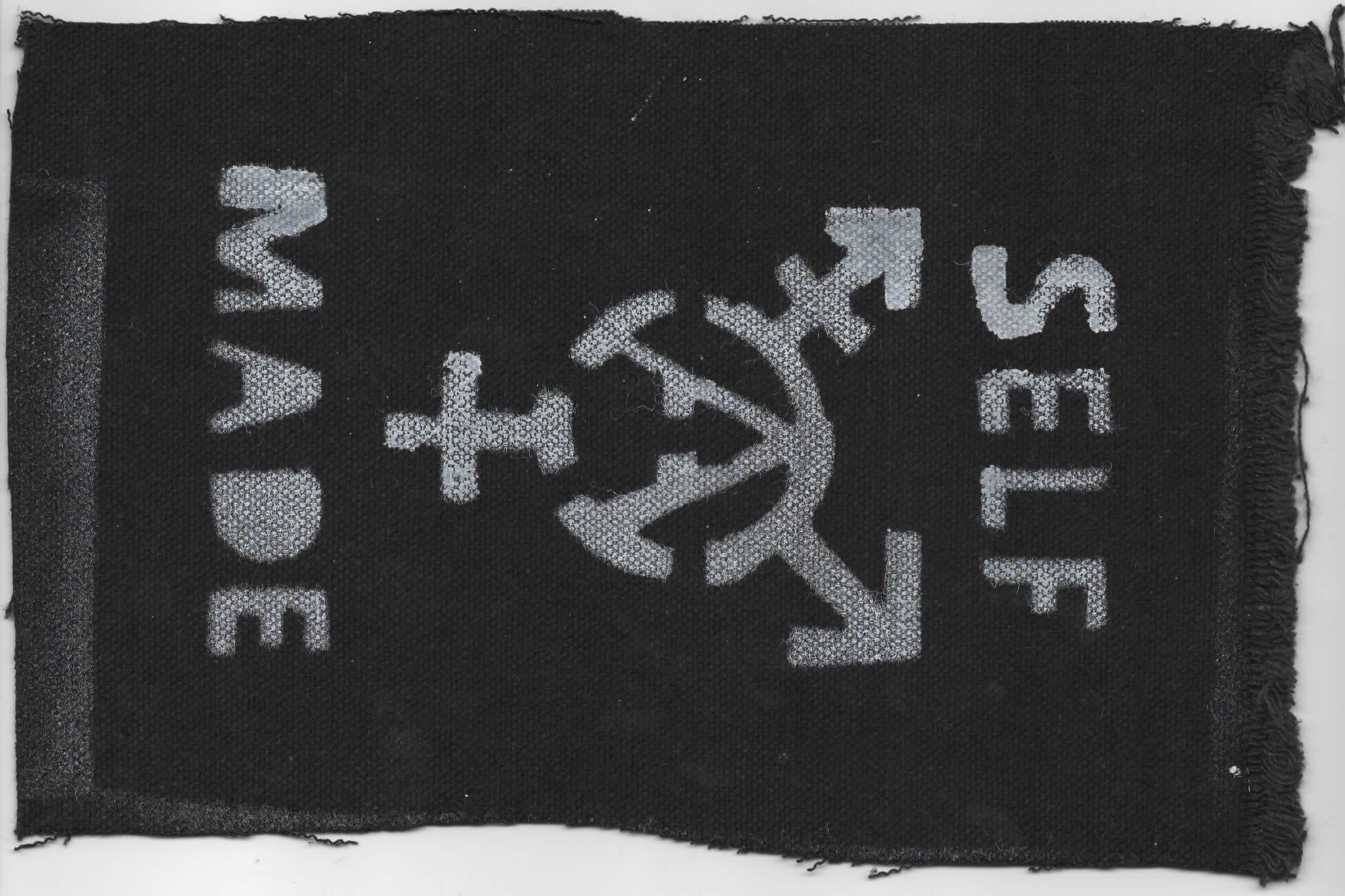 Black canvas patch with an anarchy A transgender symbol surrounded by the words 'self made'